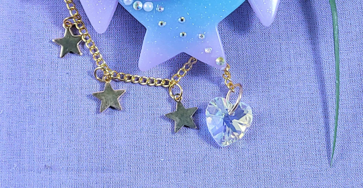 Celestial wings star moon and wing barette